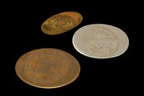P.L. Woodard & Company credit coins